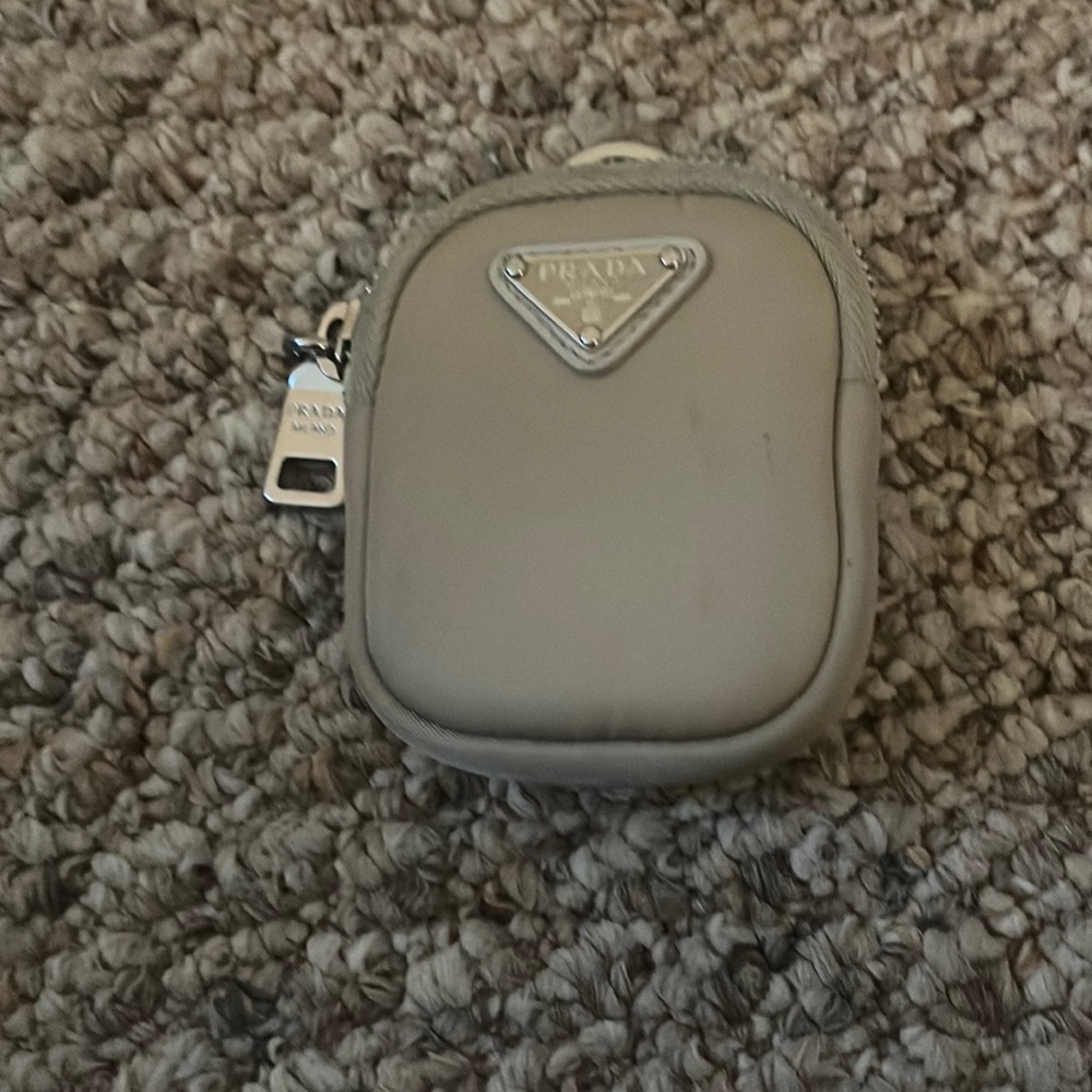 prada pouch has some wear